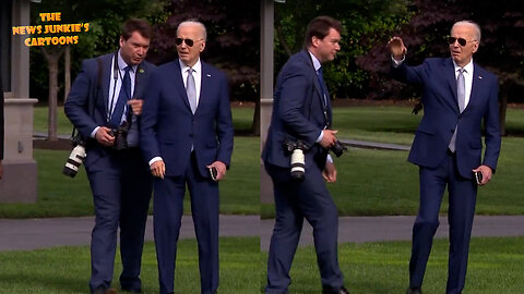 Biden's handler goes up to tell 'president' what to do.