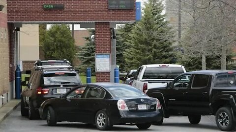 Waiting long line at drive thru at bank