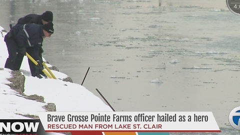 Brave officer saves man in river