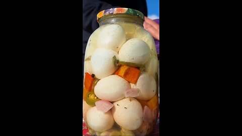 Marinated eggs in jars