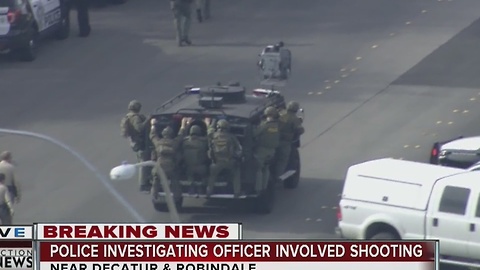 Man barricaded in house after firing at Las Vegas police