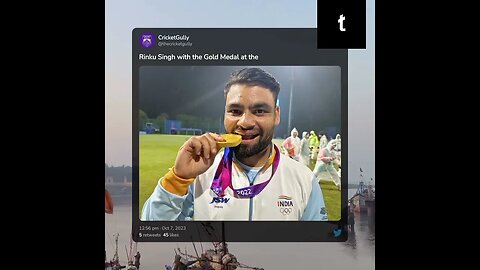 Rinku Singh holding his gold medal at the Asian Games.