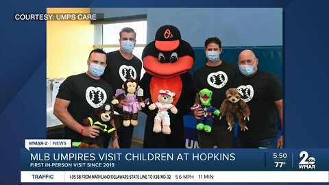 MLB umpires with UMPS CARE visit kids at Johns Hopkins Children's Center