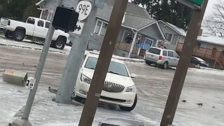 Winter storm in Oregon causes people and cars to slide down icy hill