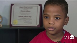 7-year-old Romulus boy credited with saving his mom; officials honor his bravery