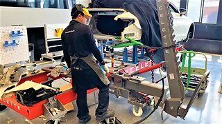Mercedes-Benz C200 rear end repair on Celette frame machine with fixtures