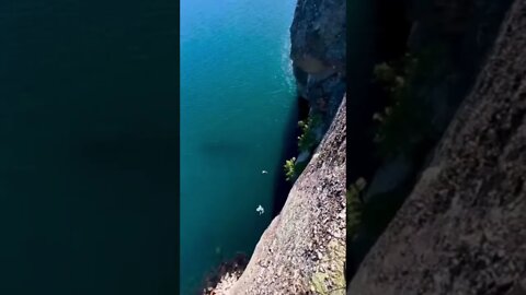 Guy dives off a 100ft cliff and survives😳#shorts #crazyvideo #dive #cliffdiving