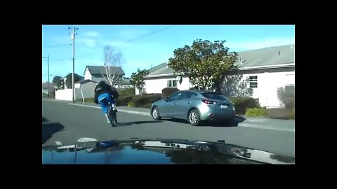 Bicycle Rider Tries To Shake Police Car!!!