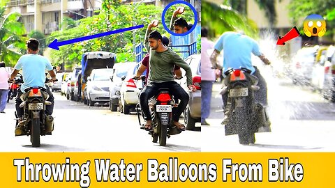 Throwing Water Balloons From Bike _ Throwing Water Balloons Prank _ 🤣Prank _