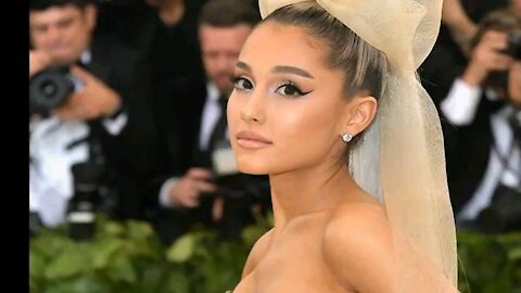 Ariana Grande tells fans to get vaxxed.