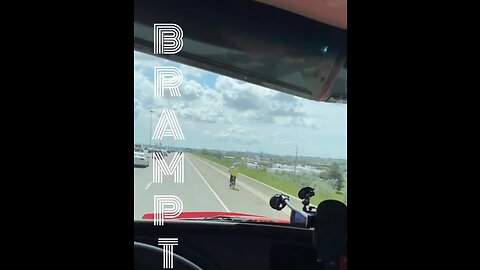 Cyclist Riding On Highway 410