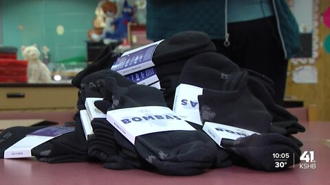 Students at New Chelsea Elementary receive new Bombas socks, thanks to administrator