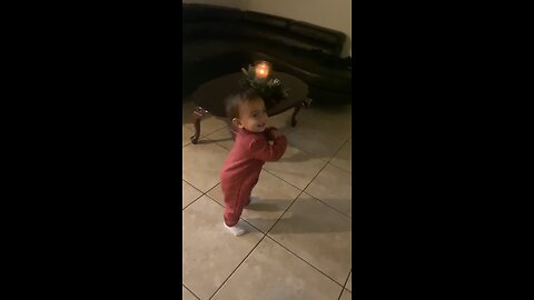 Baby dancing at party