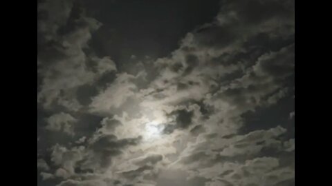 The beauty of the moon among the clouds