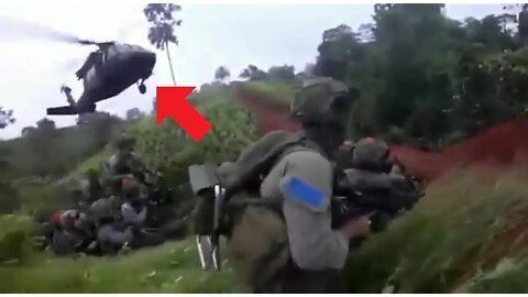 Colombian Jungle Commandos Combat Insertion Covered By Black Hawk Helicopter Minigun Fire
