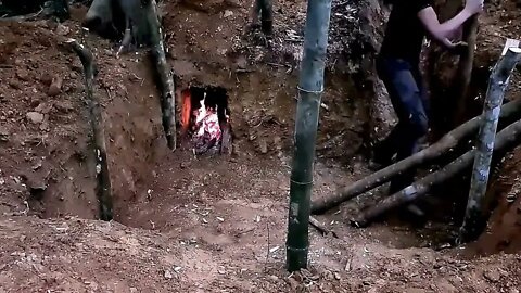 11- Dig a hole to build an underground shelter with a built-in fireplace to live in for a year!