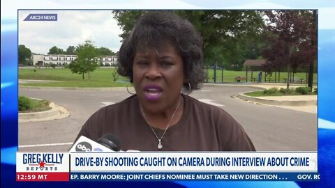 Drive-by shooting caught on camera during interview about crime