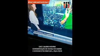 Globo mostra comemoração de escola de samba e homem está com fuzil; VEJA VÍDEO