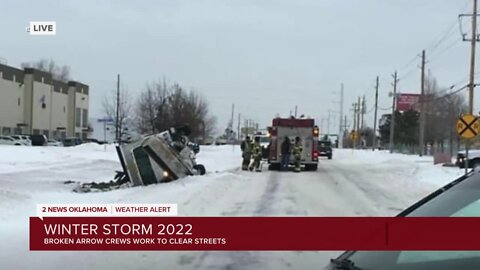 Broken Arrow snow plow turns over during snow response