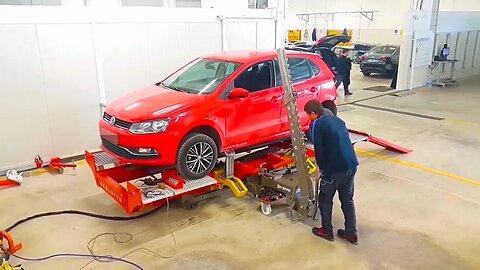 VW Polo loaded on Celette Rhone bench ready for repair