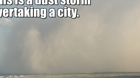 Dust storm overtakes a city