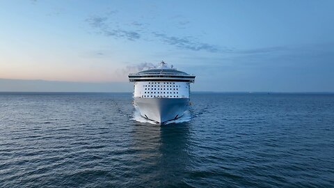 Oasis of the Seas cruises into New York Harbor at dawn
