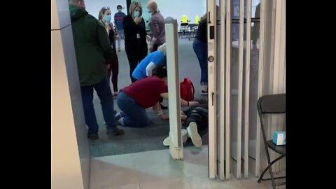 Adult male collapses leaving vaccine clinic.