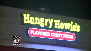 Police investigating armed robbery at Hungry Howie's Pizza