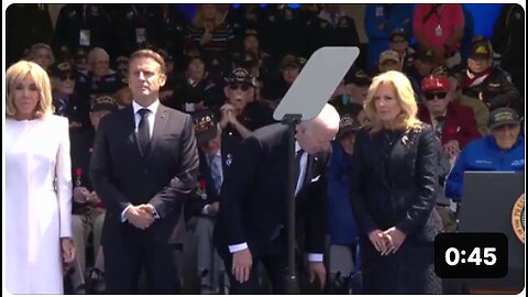 Joe Biden shits himself and points it towards Macron during the D-day celebration...🤡💩