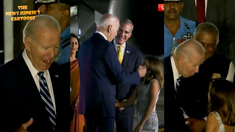 Uncle Joe greets a young girl on the tarmac after landing in India.