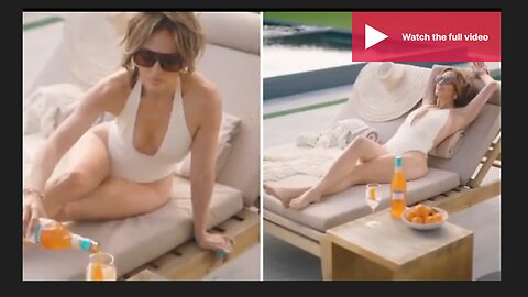 Jennifer Lopez sizzles sipping an orange cocktail by the pool