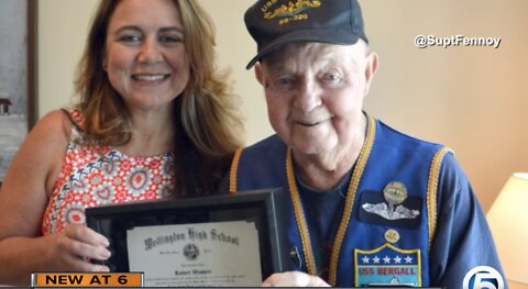 WWII vet receives his high school diploma