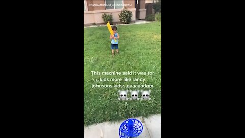 Pitching machine sends whiffle ball straight into kid's face
