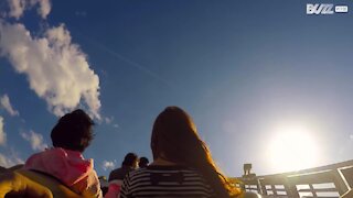 Thrilling roller coaster ride filmed from passenger seat