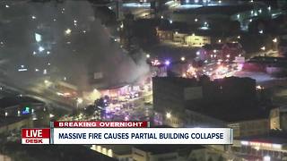 Massive fire causes downtown building to collapse inward