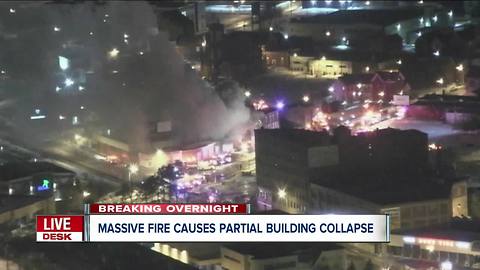 Massive fire causes downtown building to collapse inward