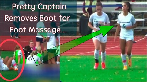 Pretty Captain Removes Boot for Foot Massage