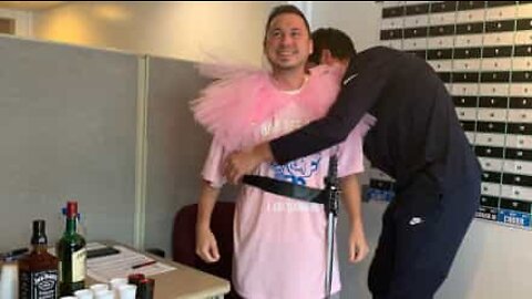 Man loses fantasy football league and wears dress for a day