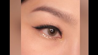 How to stick eye lashes ?