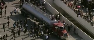 Semi-truck speeds into protestors