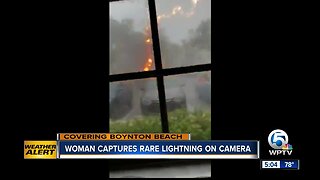 Woman accidentally captures intense lightning video