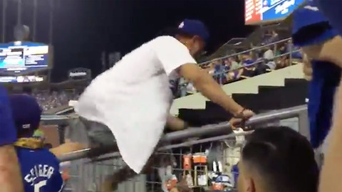Dodgers Fan CRASHES Astros Bullpen, Gets Carried Out by Police