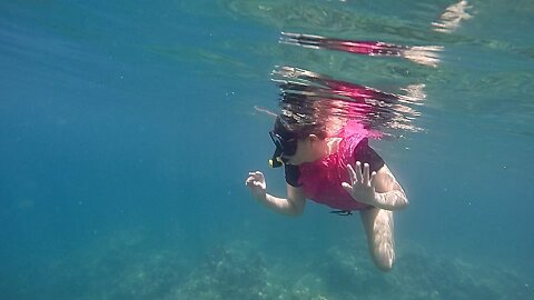 Snorkeling on pink