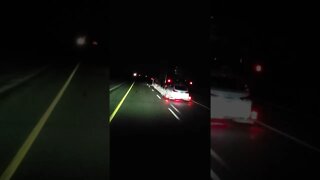 Passing a car hauler at night: 112 km/hr.