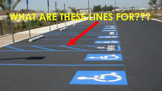 Purpose of painted lines next to handicapped parking spaces