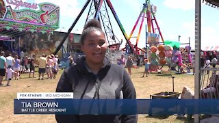 Tia Brown, 13, said it feels good to be out enjoying the nice weather and having fun with her family. Her favorite part of the event is being able to get on the rides.