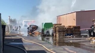 Cactus Container spars in flames in west phoenix