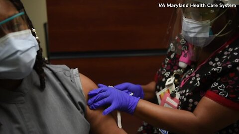 ICU nurse manager Meshondra Collins is the first person to get the COVID-19 vaccination at the Baltimore VA Medical Center