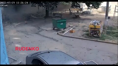 Woman on bike narrowly avoids death as Ukrainian shelling hits a residential courtyard in Donetsk