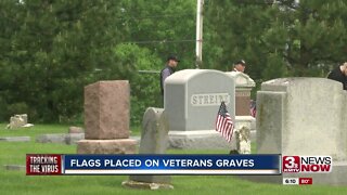 Flags placed on graves of veterans